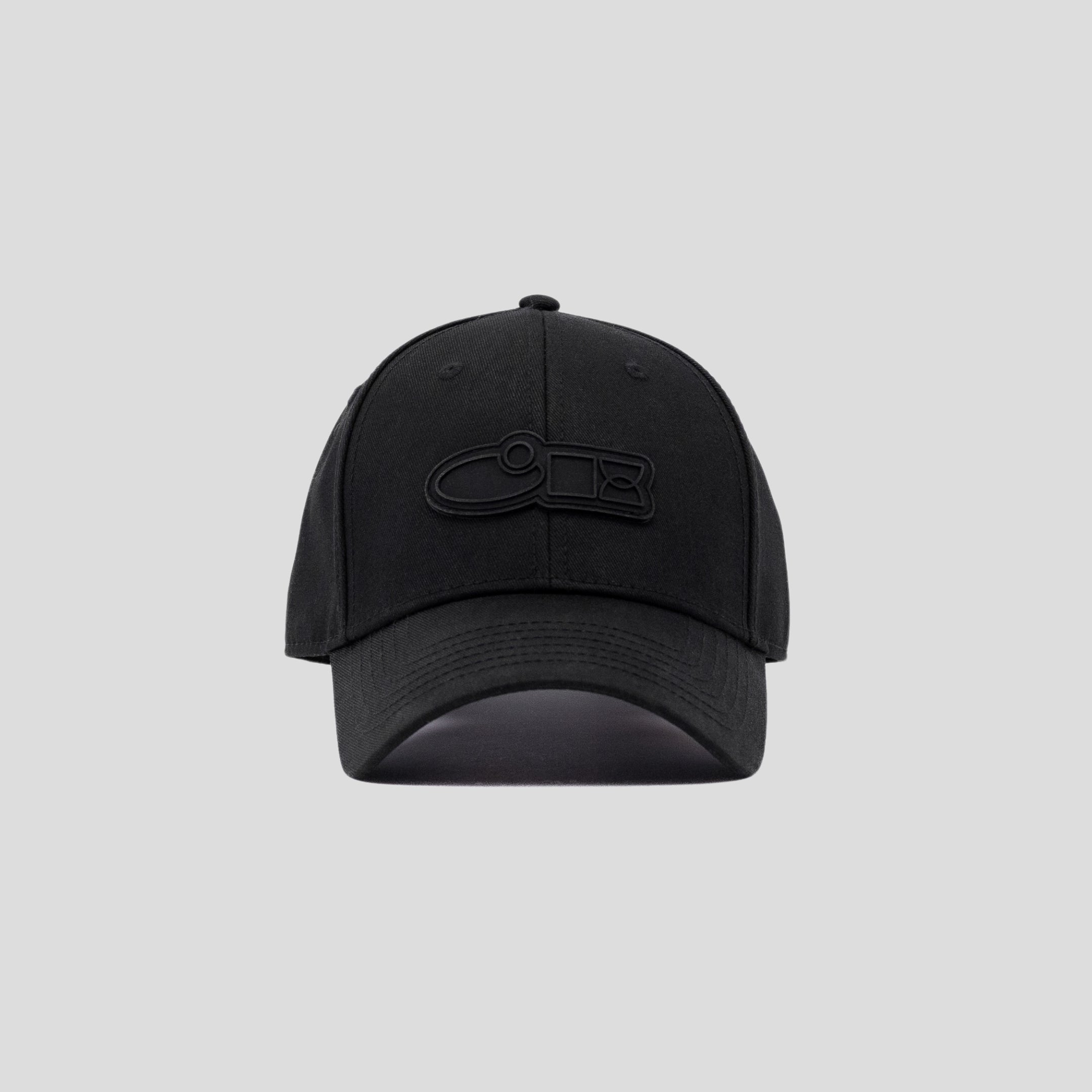 Front view of a black baseball cap featuring a raised embroidered minimalist logo in matching black thread, displayed on a plain light gray background